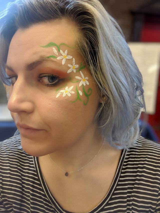 Daisy vine painted around the eye