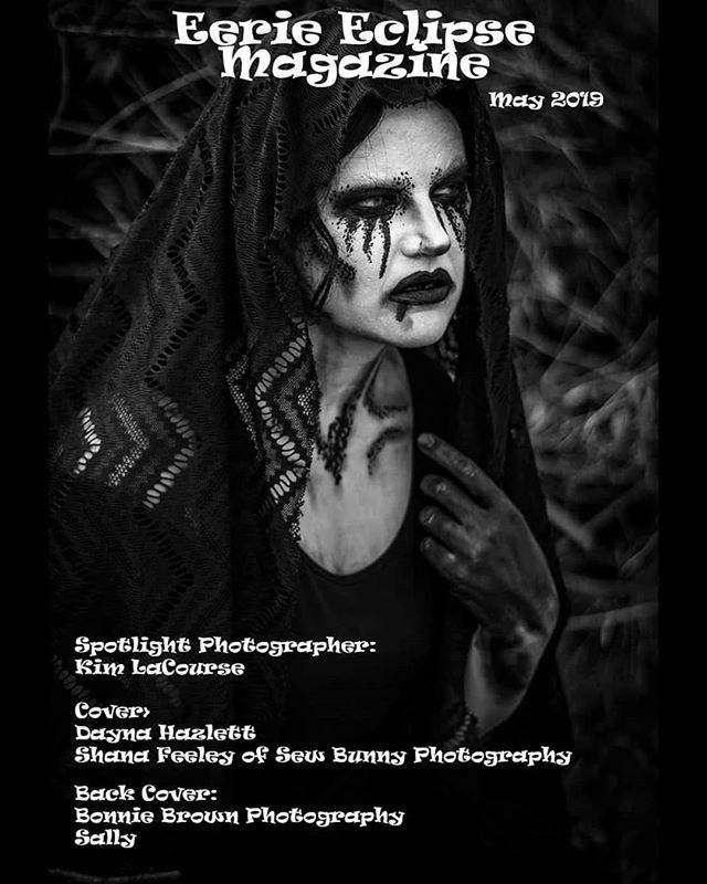 Black-and-white Eerie Eclipse Magazine cover: dark-eyed figure in a hood