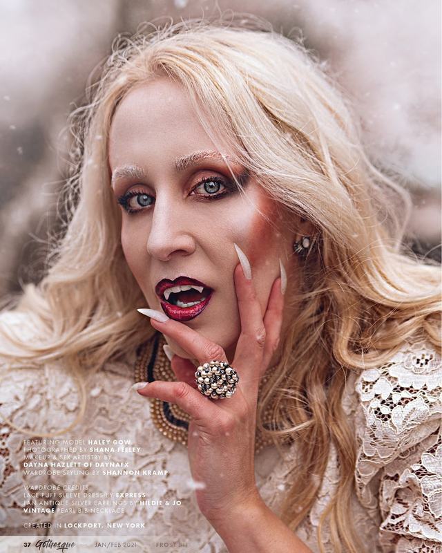 Frost Bite portrait: vampire fangs and a ruby ring