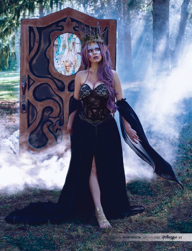 Gothesque page: full-length gown in a misty forest