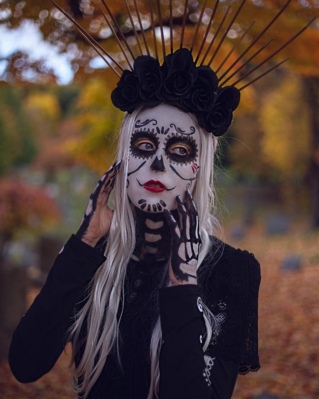 The halo sugar-skull look against autumn leaves