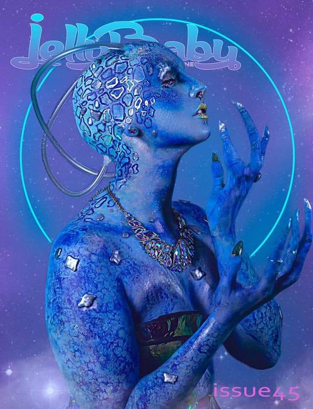 Jelly Baby magazine cover: a blue alien with glittering skin