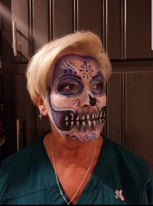 Sugar skull worked in violet and purple